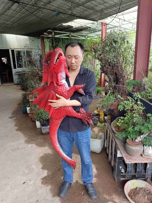 Handsteuerfertigte animatronic realistische Dinosaurier-Baby-Marionette besonders an